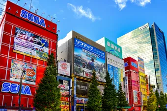 Colorful display of buildings and signs in Akihabara, Tokyo, showcasing city life and vibrant urban culture.