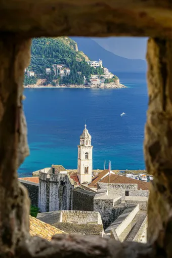 The Old Town of Dubrovnik, enclosed by monumental city walls, is filled with palaces, churches, and paved streets inherited from the Republic of Ragusa. Its historic center reflects a rich maritime and cultural past preserved through the centuries.
