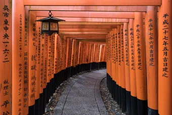 The torii gate pathway at Fushimi Inari Taisha is an iconic trail made of thousands of red gates. It winds up the hillside and symbolizes offerings and Shinto spirituality.