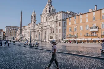 Captivating view of Piazza Navona with tourists enjoying a sunny day
