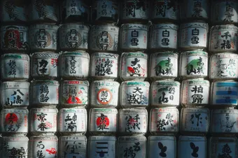 These sake barrels are often stacked at Japanese temples as offerings. They symbolize the connection between brewers, tradition, and Shinto deities.